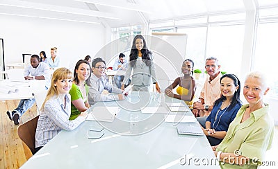 Group of Multiethnic Cheerful Corporate People Having a Meeting