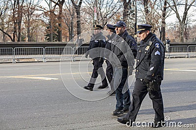 Group of NYC police officers walking