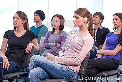 Group of people listening seminar.