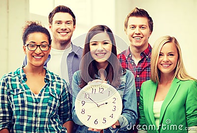 Group of students at school with clock