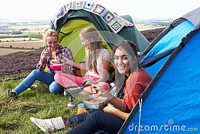Group Of Teenage Girls On Camping Trip In Countryside