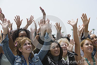 Group Of Women Raising Hands