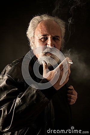 Grumpy man with cigarette