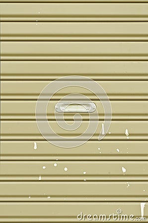 Grungy corrugated metal sheet slide door
