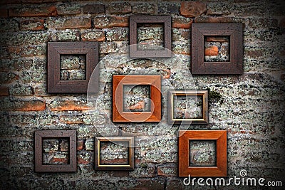 Grungy old wall full of wooden frames