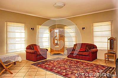 Guest room with red sofas