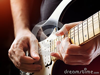 Man playing guitar on a stage. Musical concert