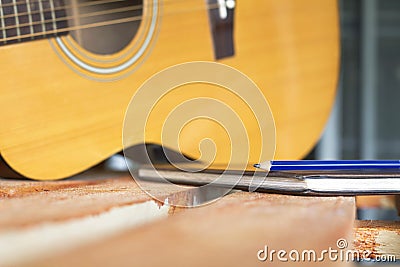 Guitar and pencil for create music