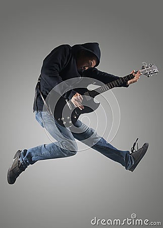 Guitar player jumps