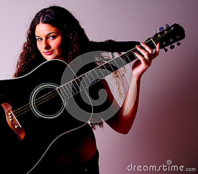 Guitar on a Woman