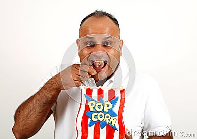 [Image: guy-eating-popcorn-15568418.jpg]