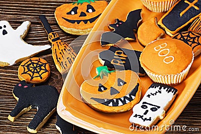 Halloween cookies on orange plate