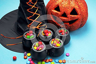Halloween witch cauldrons full of candy