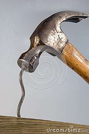 Hammer and bent nail