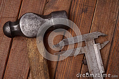 Hammer and caliper. Old tools
