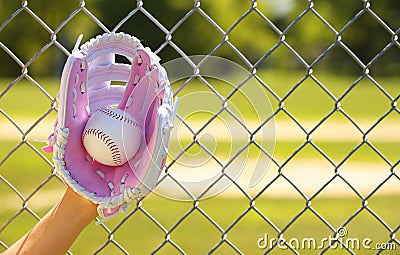 Hand of Baseball Player with Pink Glove and Ball