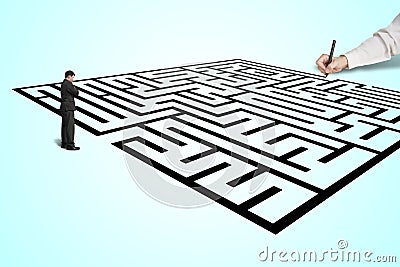 Hand drawing maze with thoughtful businessman standing in from