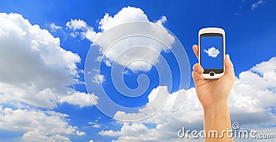 Hand holding smart phone with blue sky