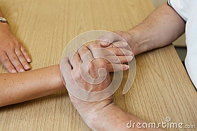 Occupational+Therapy+Hand+Therapy+Exercises Hand occupational therapy male Therapist doing massage on female hand.