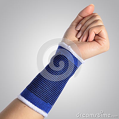 Hand with a orthopedic wrist brace
