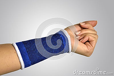 Hand with a orthopedic wrist brace