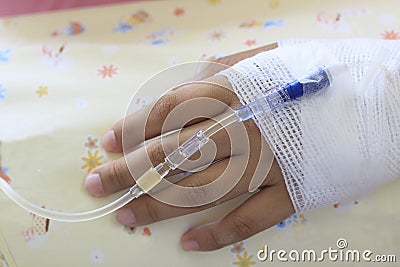 Hand of patient lying on hospital bed use for health and medical treatment