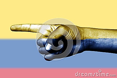 Hand point with finger in Colombia national flag