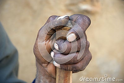 Hand of a poor, old man in Africa