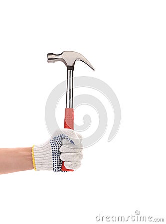 Hand with protection glove holding hammer