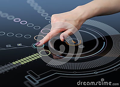 Hand pushes a button on the touch screen interface