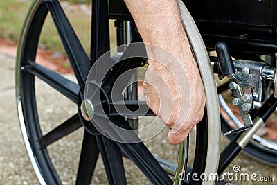 Hand On Wheelchair