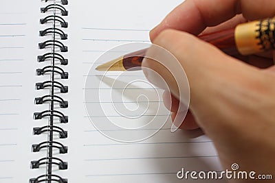 Hand writing on notebook