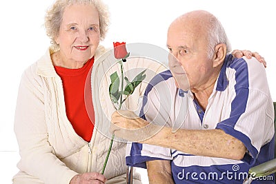 Handicap man giving his wife a rose