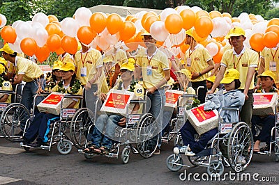 Handicapped people on wheelchair at community activity