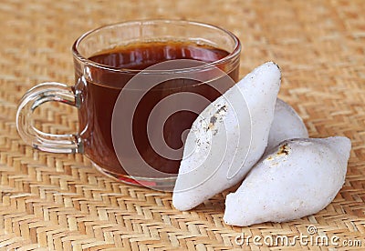Handmade Indian cuisine of rice flour with cup of tea