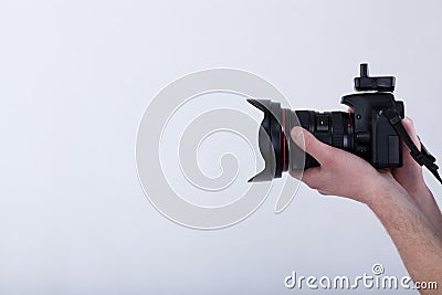 Hands with digital camera