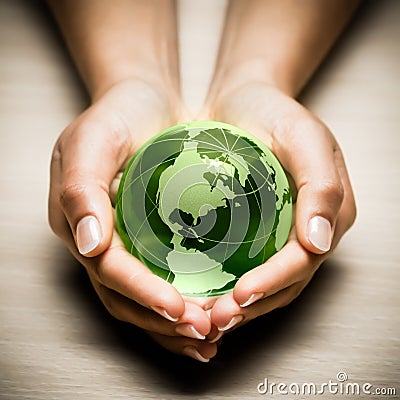 Hands with green Earth globe