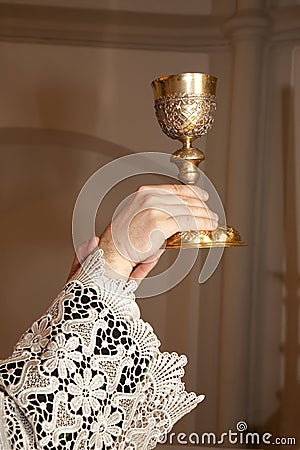 Hands of priest by the mass