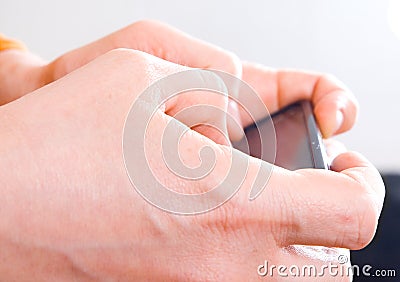 Hands with a smartphone