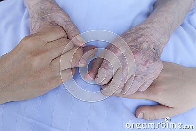 Hands of three generations