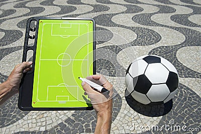 Hands Writing on Football Tactics Board Rio Beach Brazil