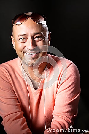 Handsome bold mid aged man with sunglass