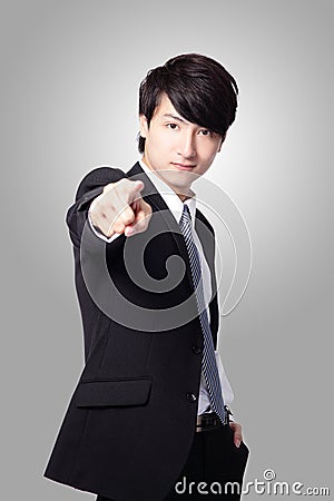 Handsome business man pointing at you