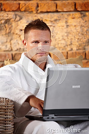 handsome-man-computer-bathrobe-18240303.