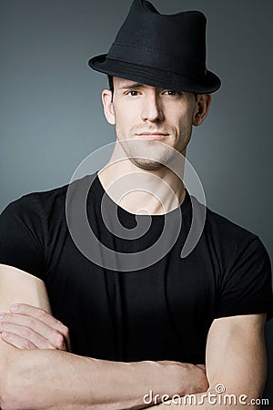 Handsome man posing in black t-shirt and bla