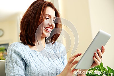 Happiness woman using tablet computer