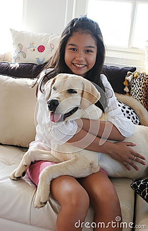 Happy Asian girl with her pet dog