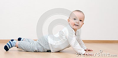 Happy baby boy crawling