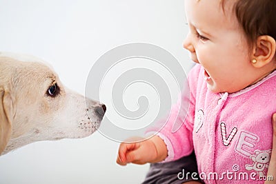 Happy baby with dog