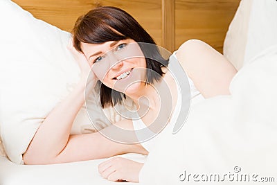  - happy-bed-young-woman-waking-up-her-31245531